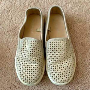 Girls’ gold slip on shoes